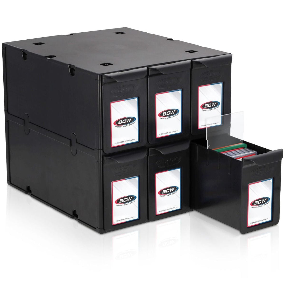 Organized graded card storage at a collector workbench