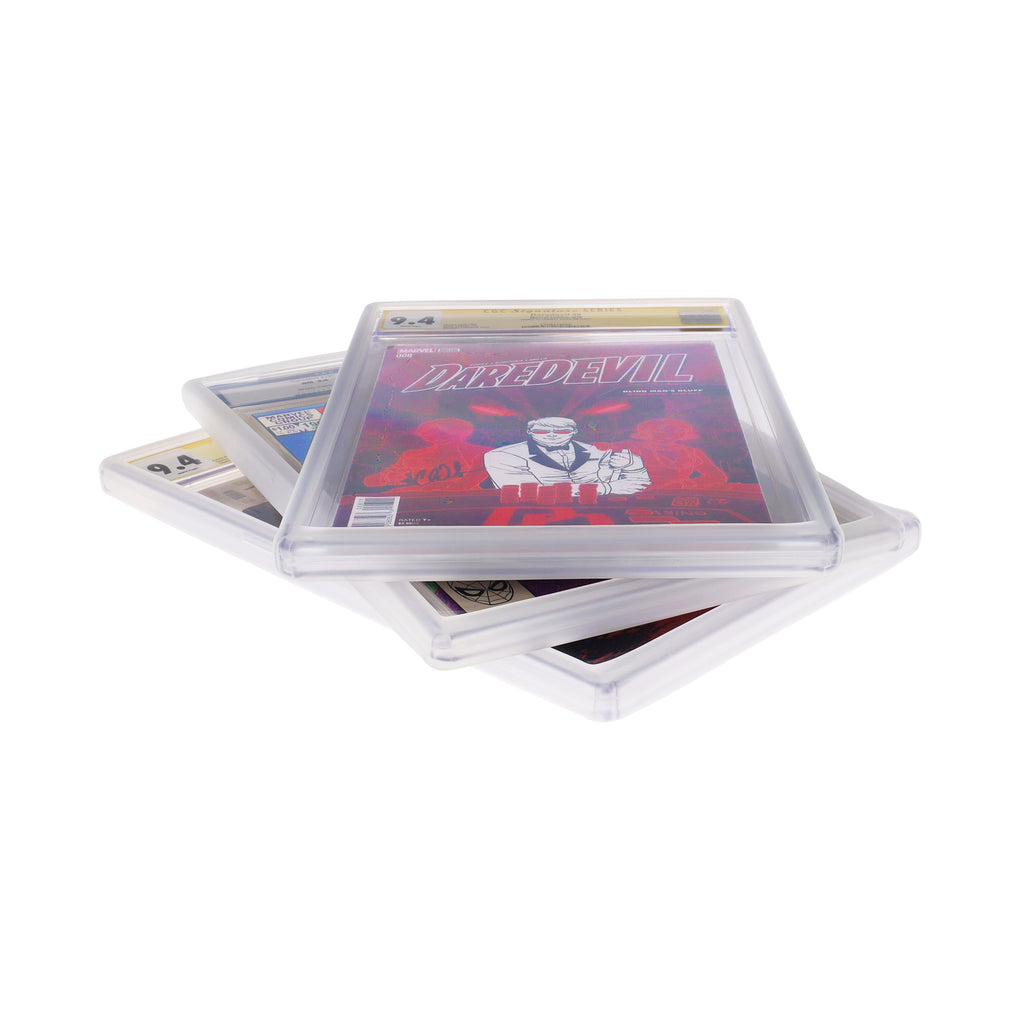 Several graded comics stacked with translucent BCW slab bumpers