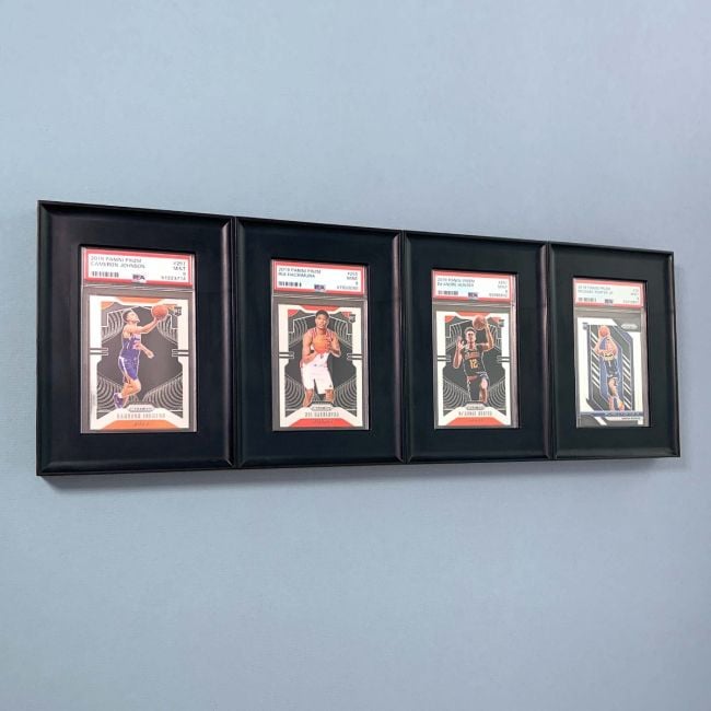 BCW interlocking graded card frames holding four graded cards